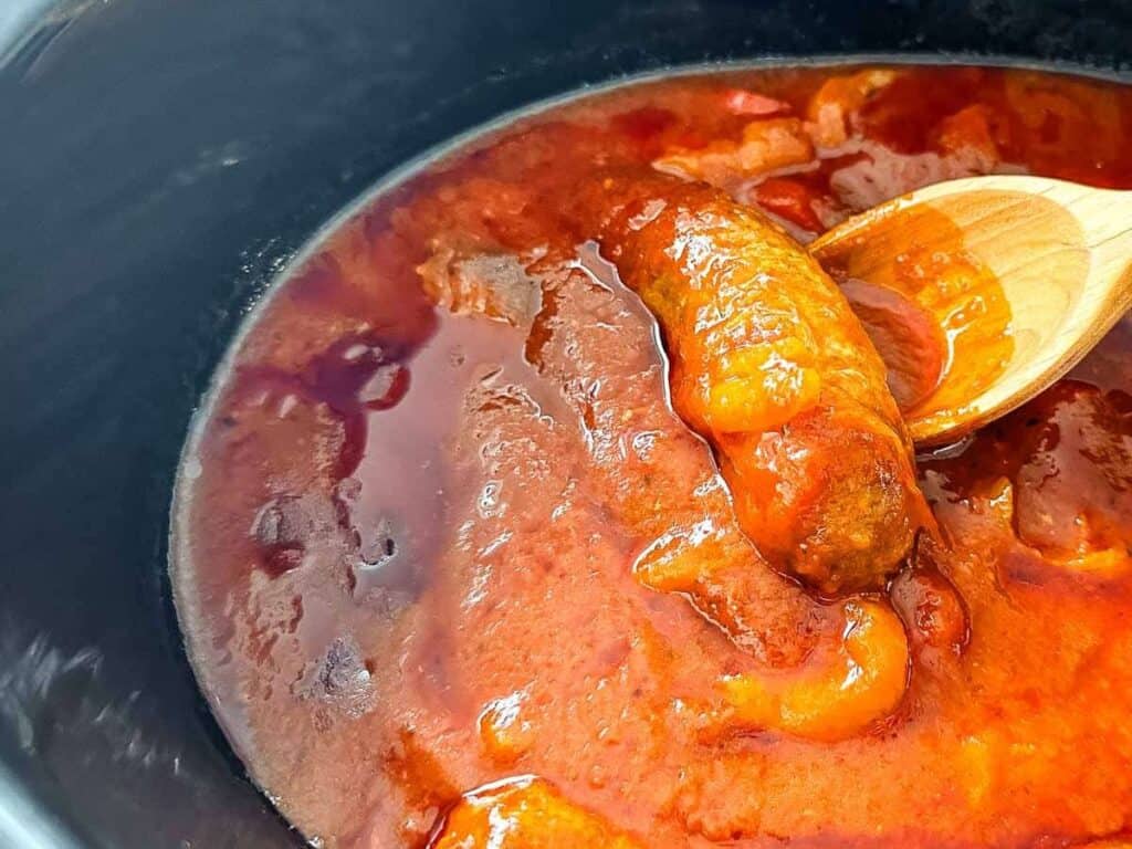 Image shows slow cooker sausage and peppers recipe.
