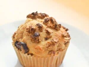 Image shows yummy and homemade apple cinnamon muffin.