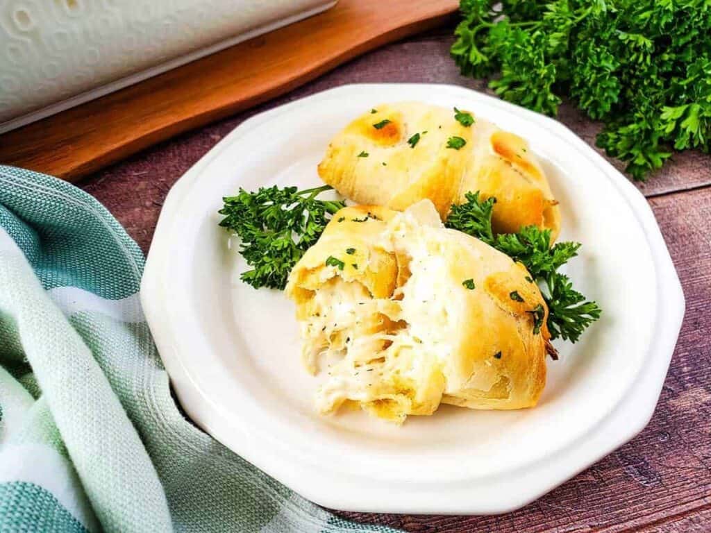 Image shows yummy chicken stuffed crescent rolls.