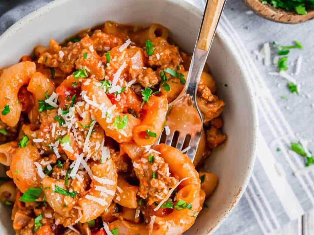 Image shows yummy ground beef pasta skillet