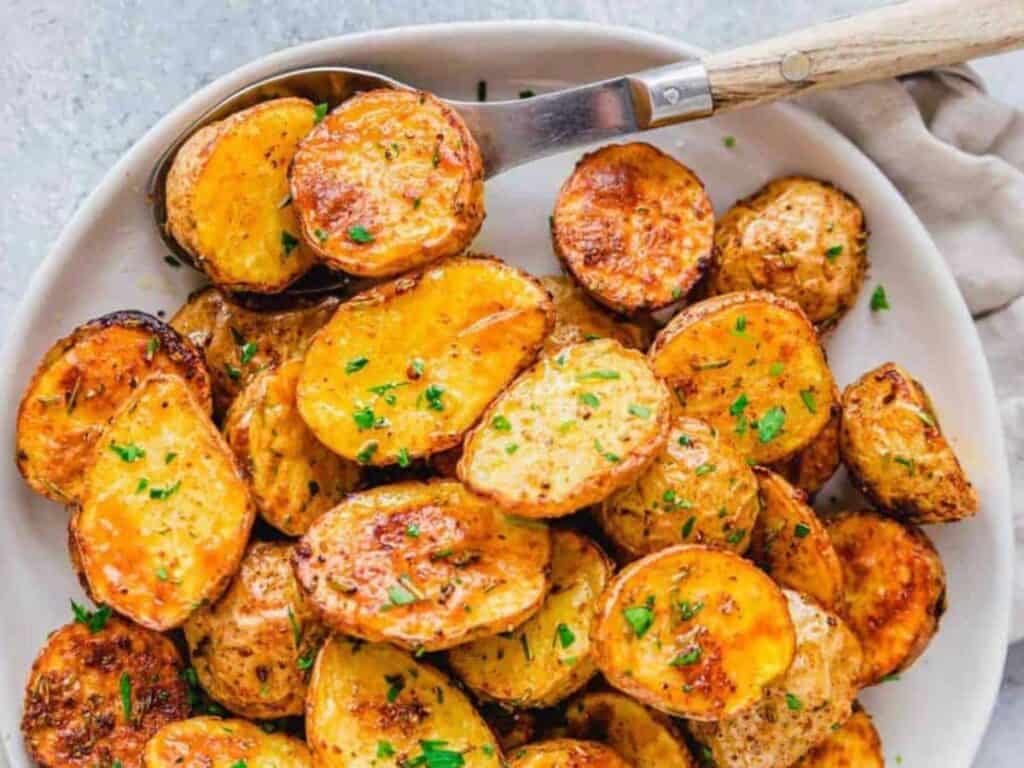 Image shows delicious air fryer baby potatoes.