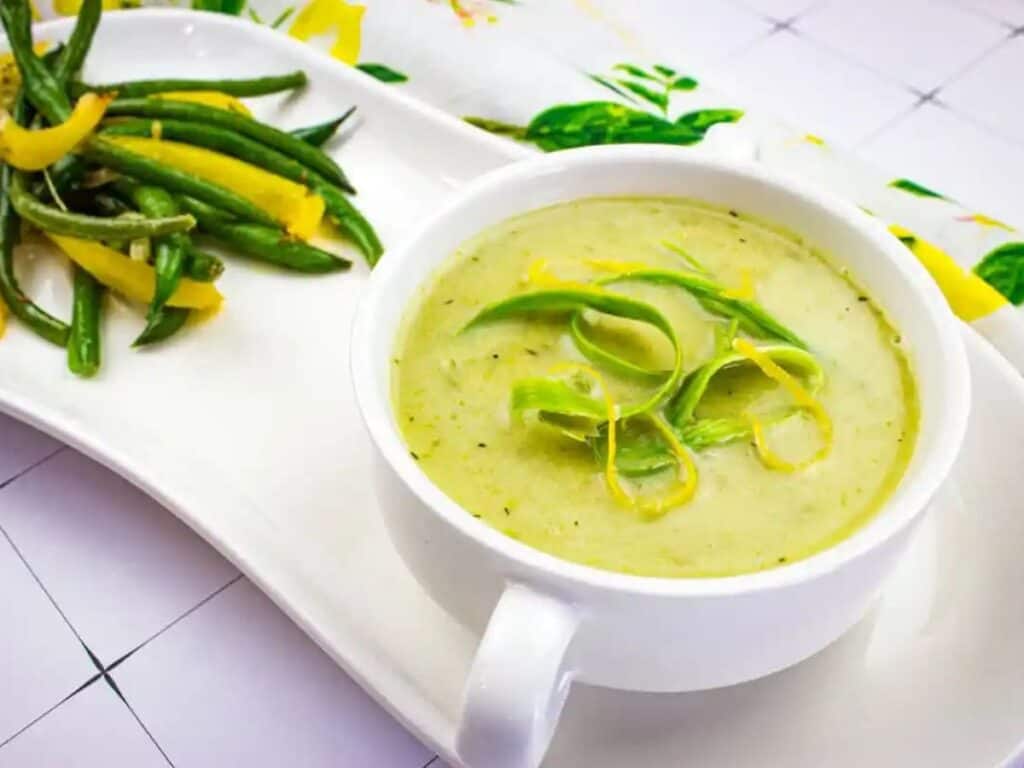 Image shows delicious cream of asparagus soup.