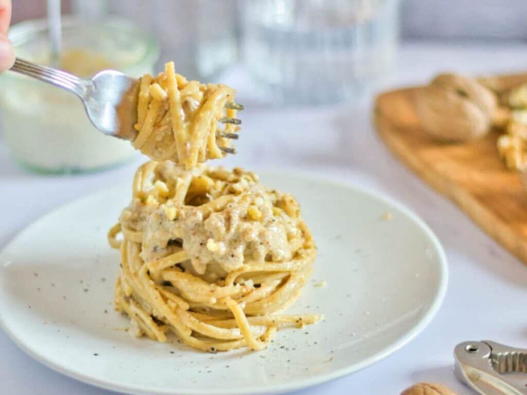 Image shows easy to make Italian walnut sauce pasta.