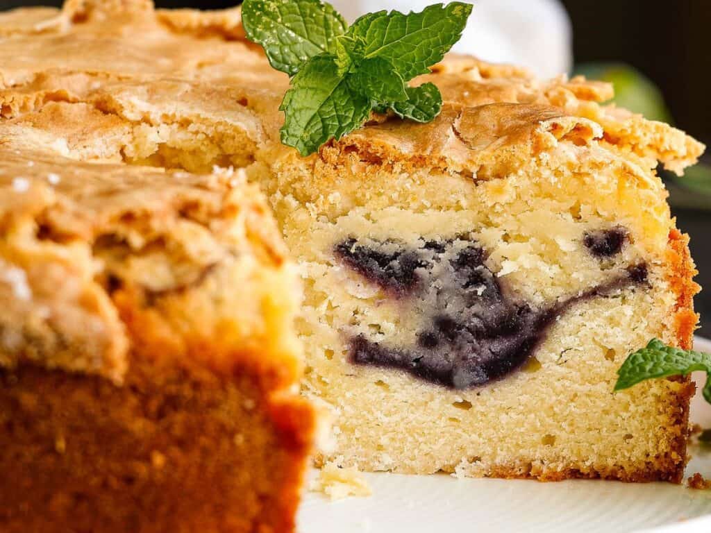 Image shows easy to make blueberry swirl pound cake.