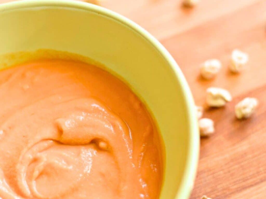 Image shows yummy Instant Pot chickpea tomato soup.
