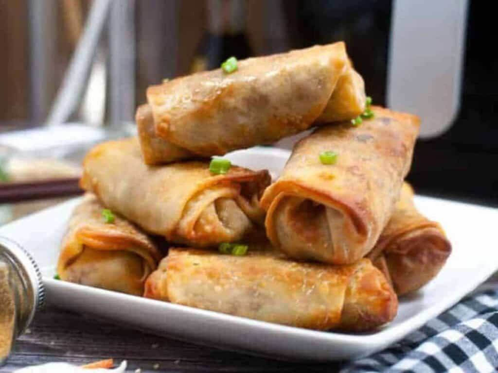 Image shows yummy air fryer spring rolls.