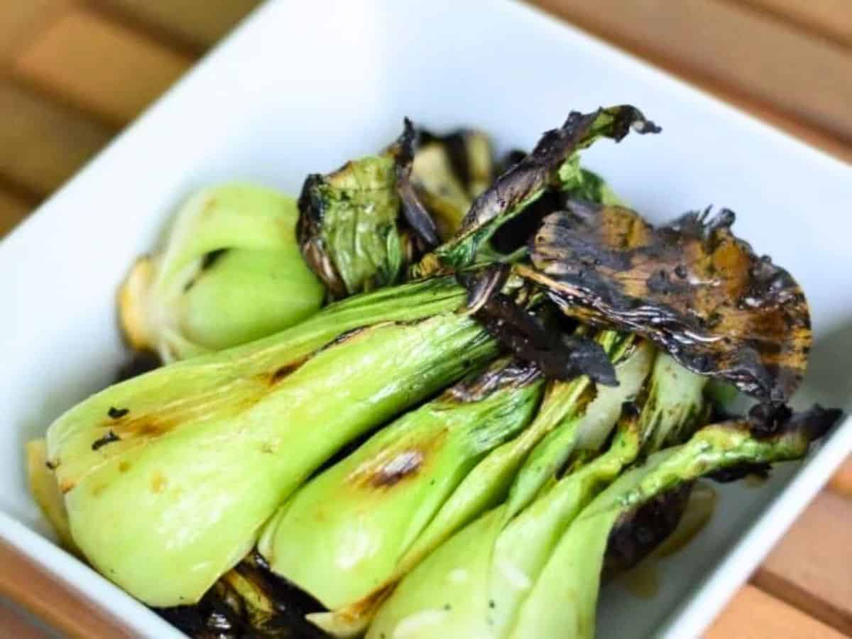 Image shows bowl of irresistible baby bok choy.