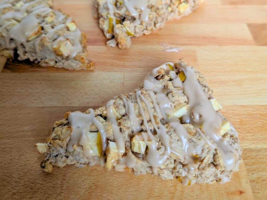 Image shows a Close-up of a freshly baked apple scone.