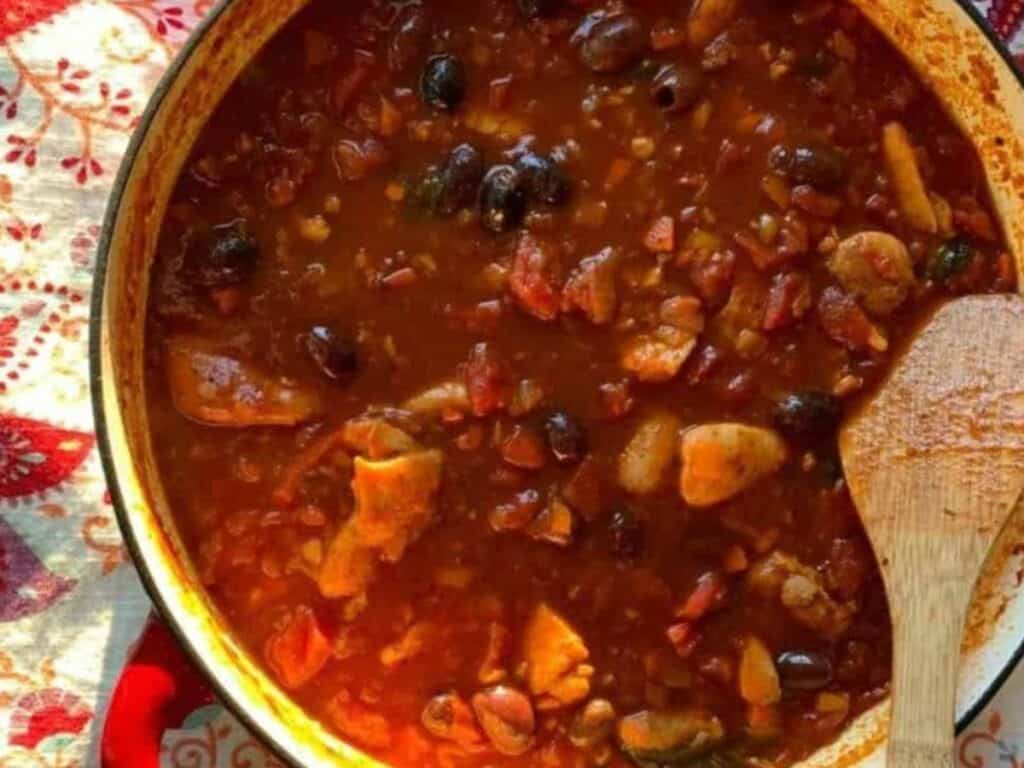 Image shows dutch oven chicken cacciatore.