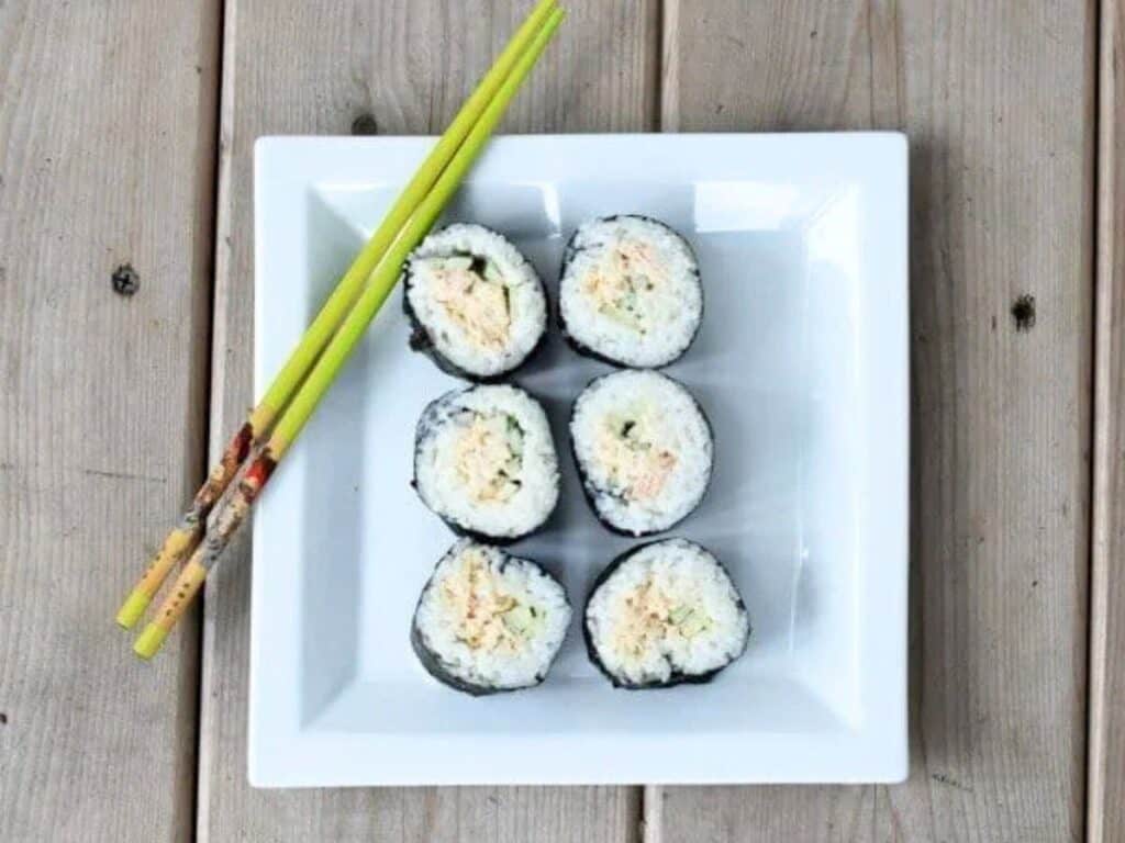 Image shows easy to make homemade spicy tuna roll.