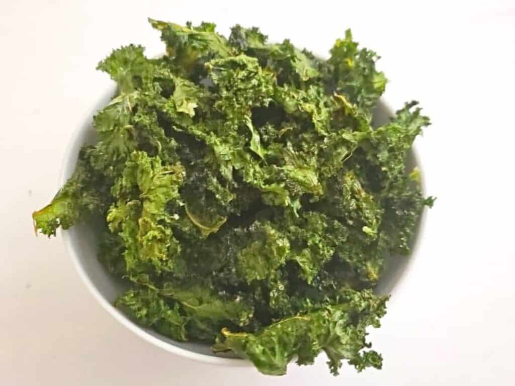 Image shows easy to make baked kale chips.