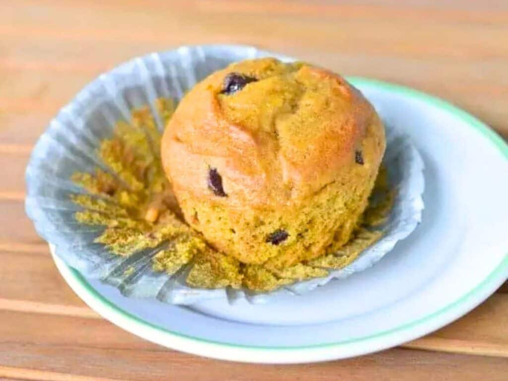 Images shows easy to make chocolate chip pumpkin muffin.