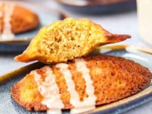 Image shows easy to make pumpkin madeleines with maple glaze.