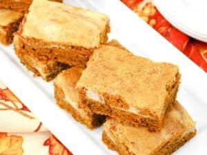 Image shows simple pumpkin cream cheese bars.