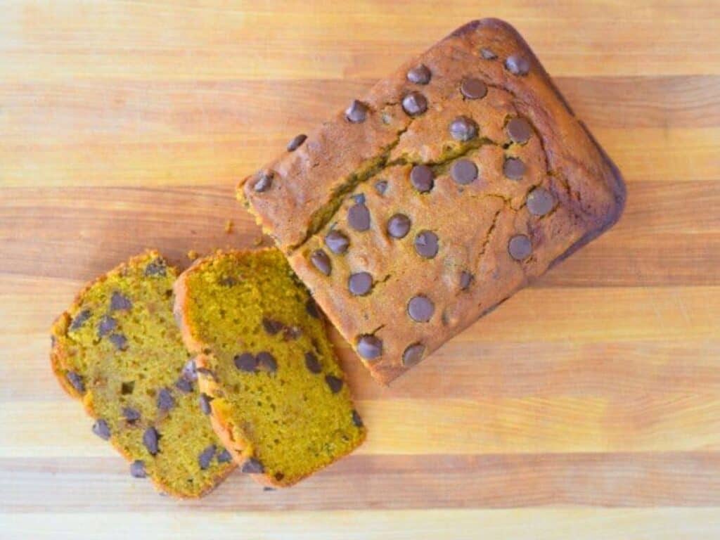 Image shows slices of easy-to-make chocolate chip pumpkin bread.