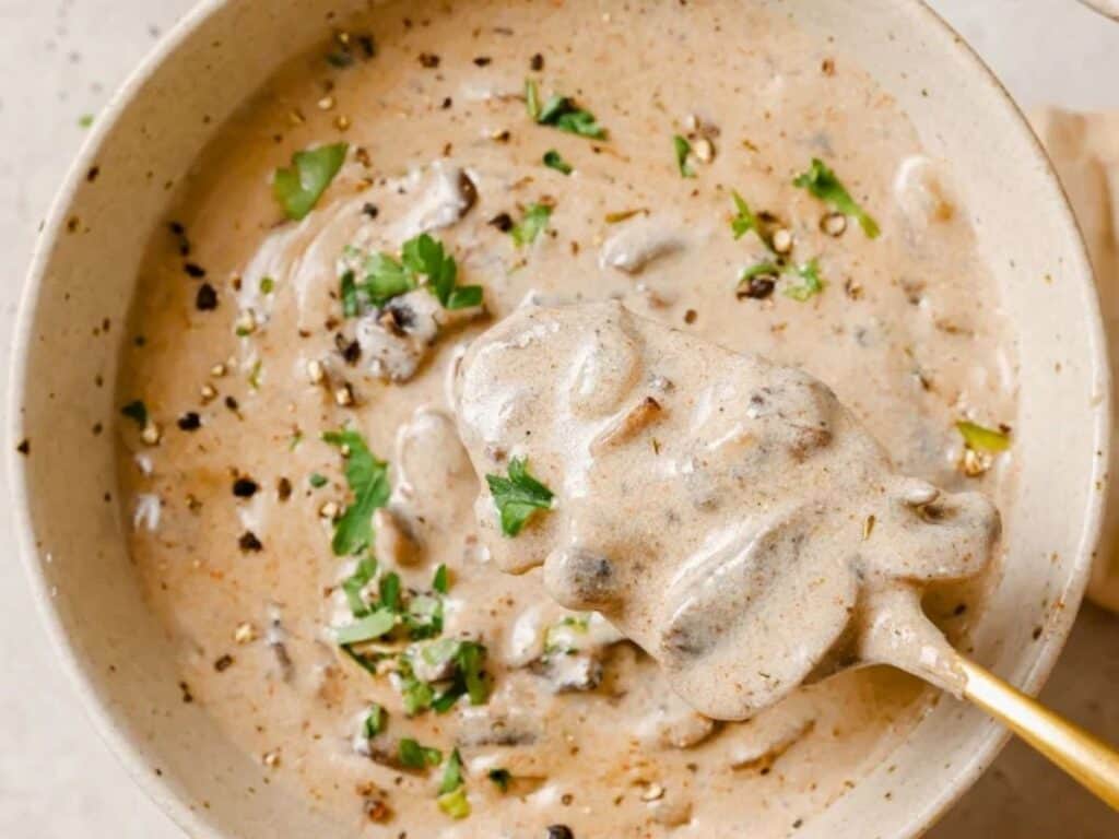 Image shows irresistible Hungarian mushroom soup.