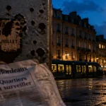 Quartiers de bordeaux à éviter : rue bordelaise au crépuscule