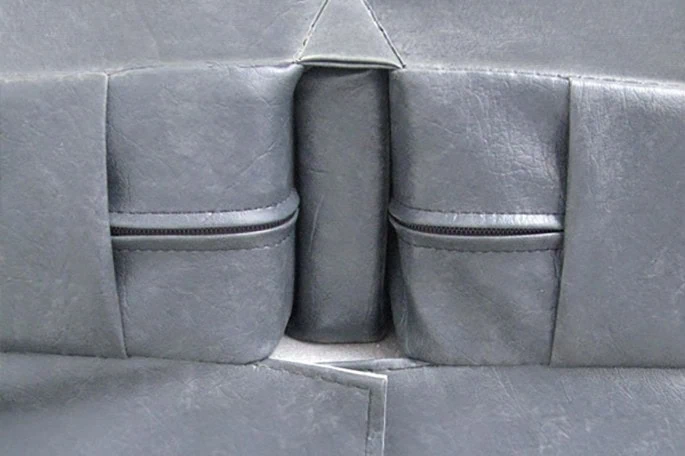 Detailed view of a reinforced hinge of a spa cover, designed for durability and added strength.