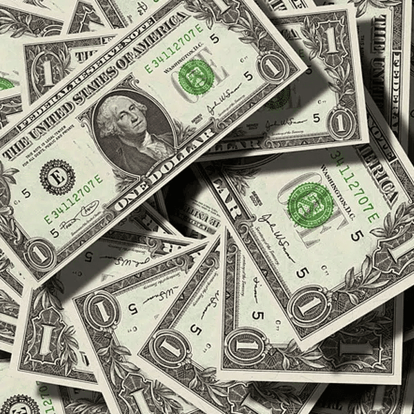 Stacks of US dollar bills, emphasizing investment opportunities and financial growth relevant to Houston EB5 immigration programs.