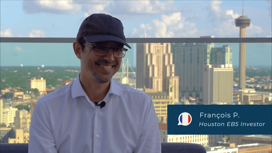 Professional Houston EB5 investment interview with François P., Houston EB5 investor expert, showcasing Houston's real estate skyline and EB5 opportunities for international investors.