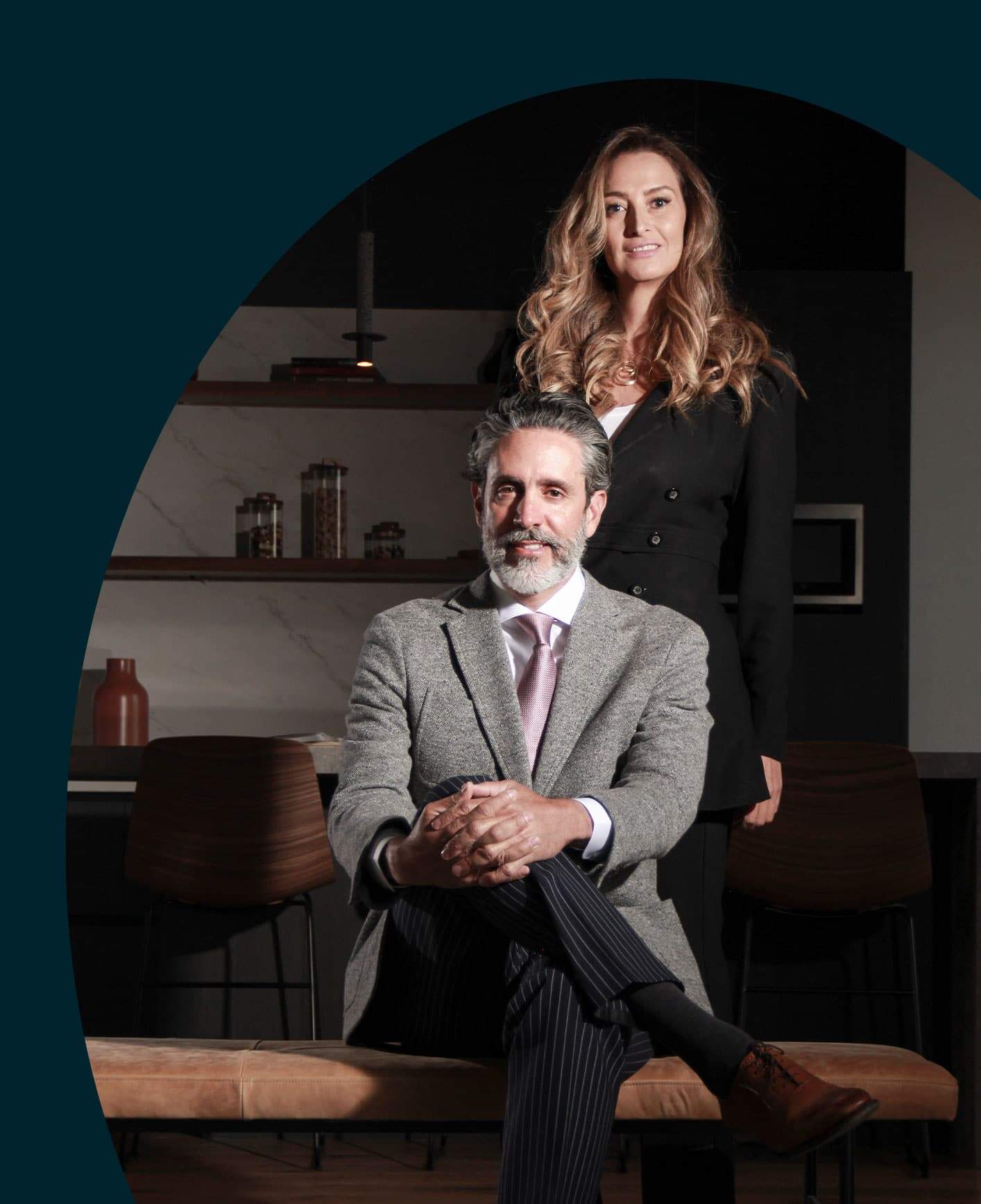 Luxury professionals in Houston discussing EB5 investment opportunities in a modern, sophisticated setting.