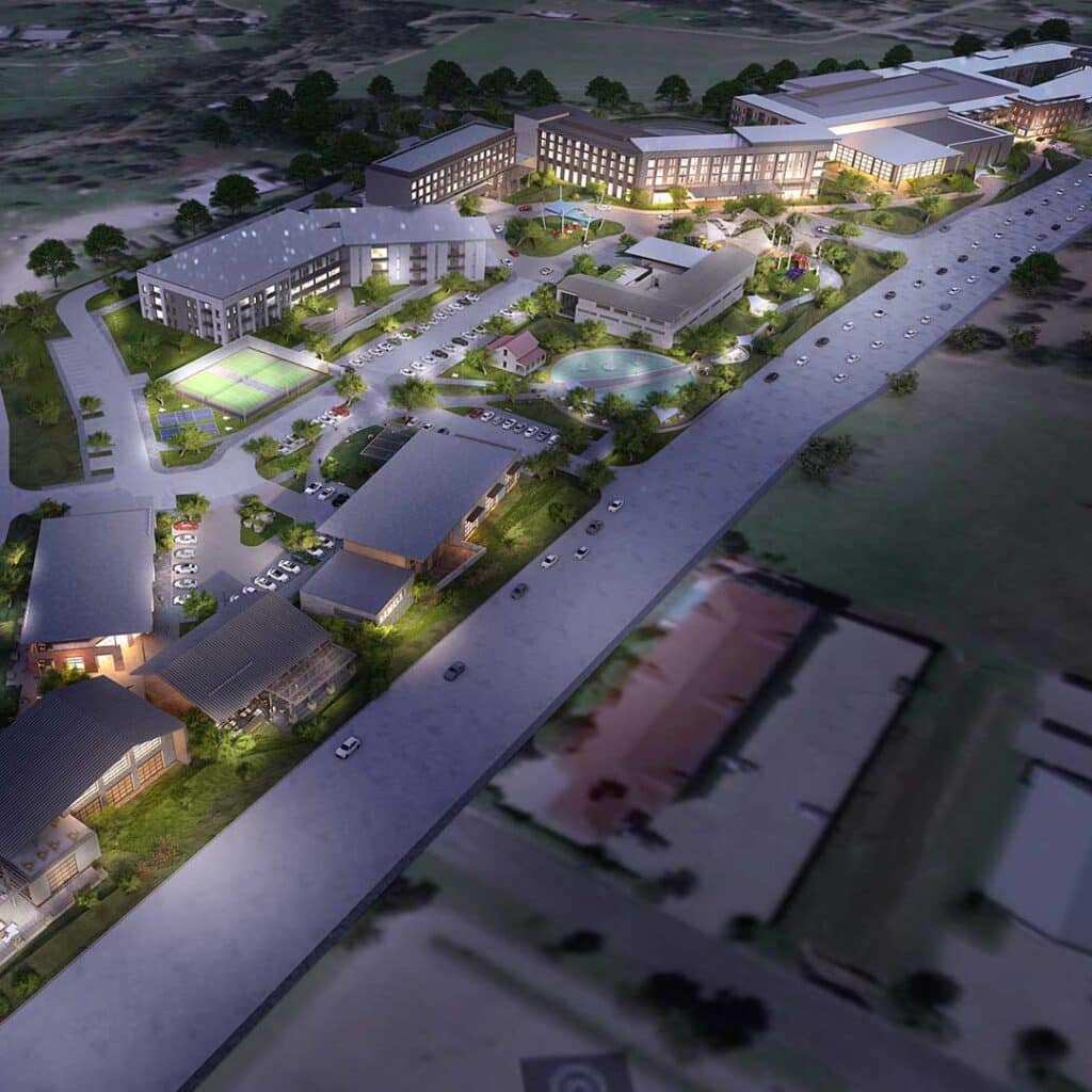 Modern Houston EB5 development project aerial night view showcasing residential, commercial, and recreational facilities for investment opportunities.