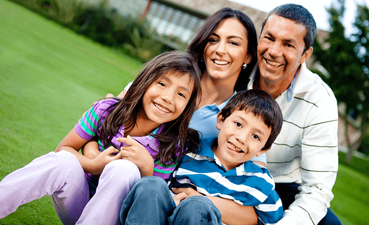 Family enjoying outdoor scenery, representing Houston EB5 investment opportunities in welcoming community settings.