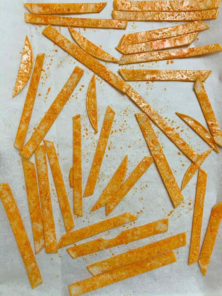 corn tortillas ready to be toasted in the oven