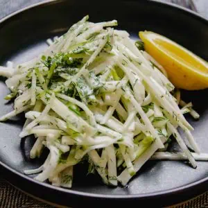 Kohlrabi Salad With Apple And Dill on a plate.