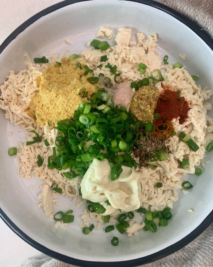Ingredients for tofu salad ready to be mixed together.