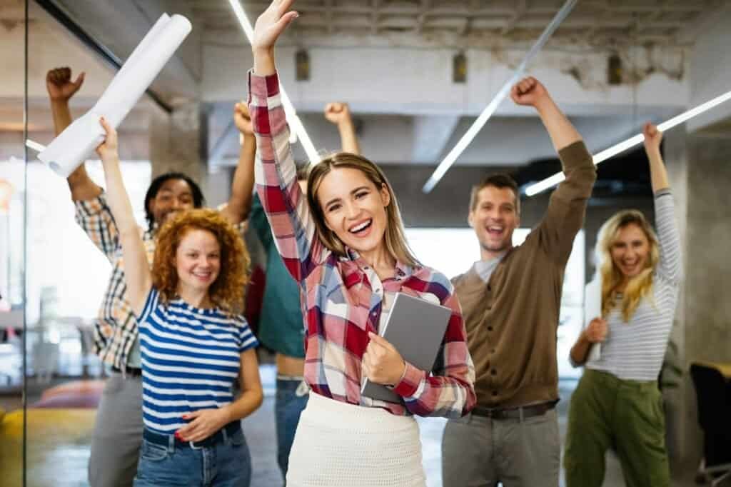 successful company with happy employees in modern office 1 1