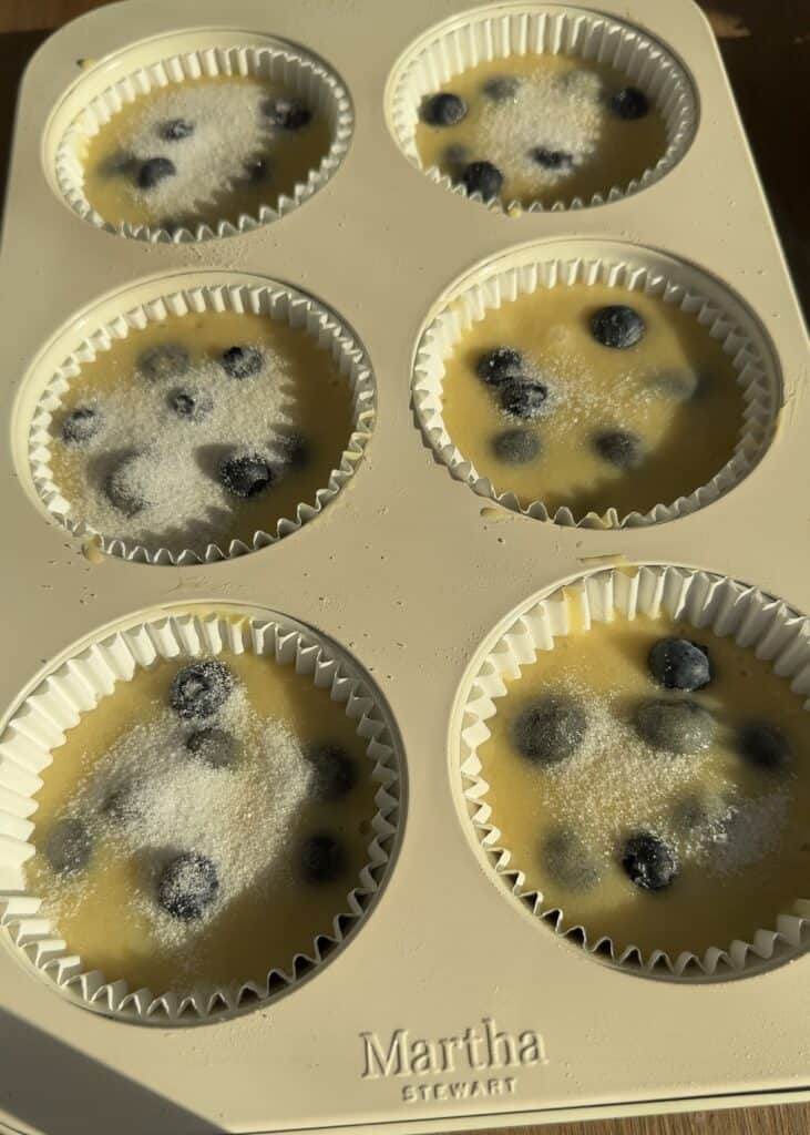 Sprinkle a light layer of granulated sugar on top of each muffin for a sweet, crispy finish to your bakery-style blueberry lemon muffins