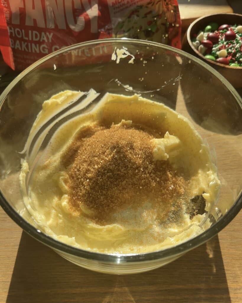 Soft butter beaten with brown sugar and granulated sugar until creamy for the Festive Holiday Cookies