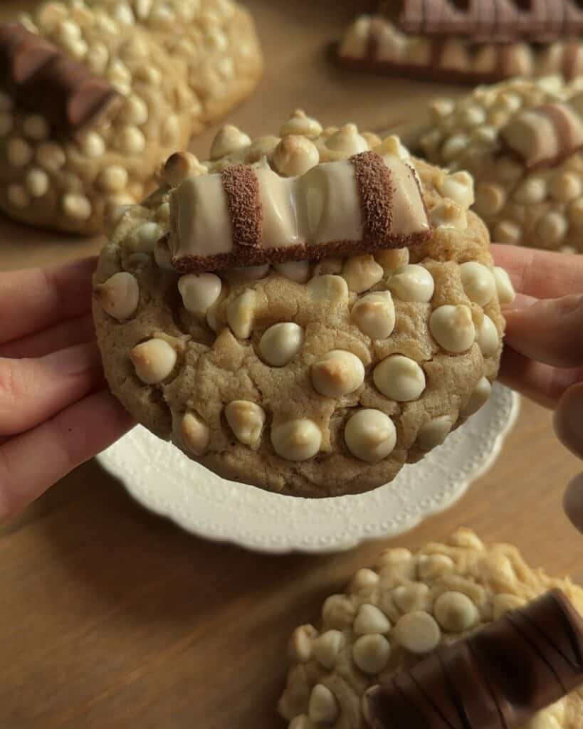 Closeup of a gooey Kinder Bueno cookie with melted white chocolate chips