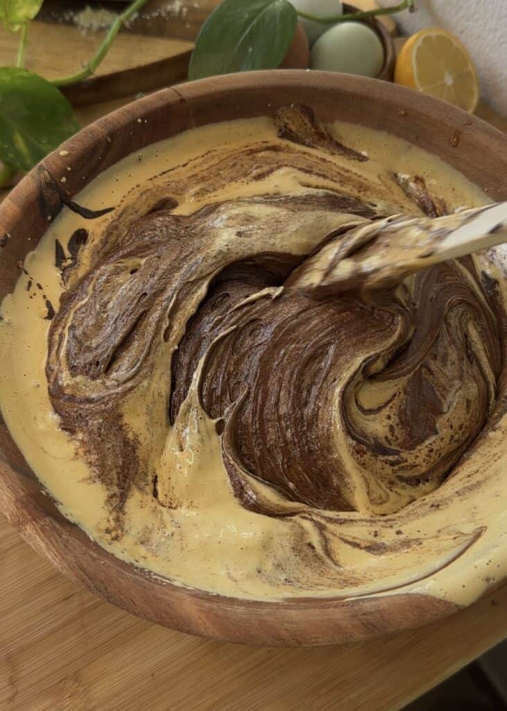 Light and fluffy beaten eggs with brown sugar, ready to be added to brownie batter