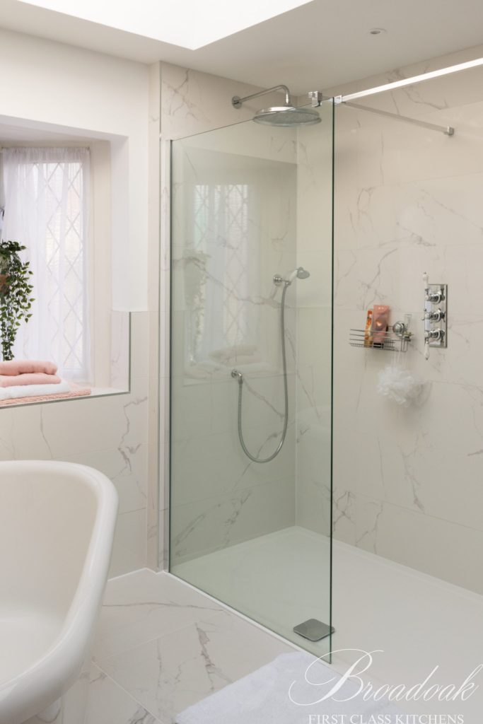 Bath and shower in fully fitted bathroom