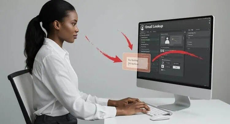 Professional using email lookup tools on computer screen