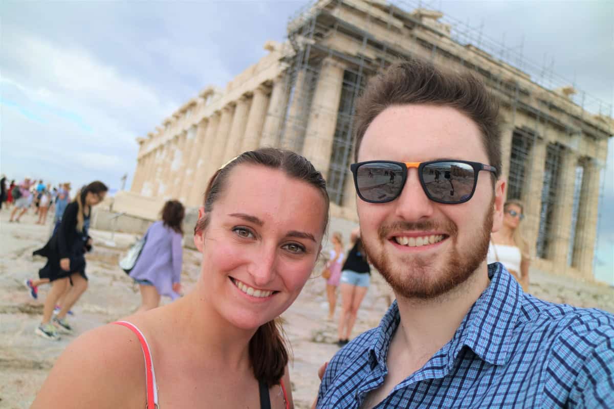 Hayden and Sophie taking a selfie in front of the Parthenon.