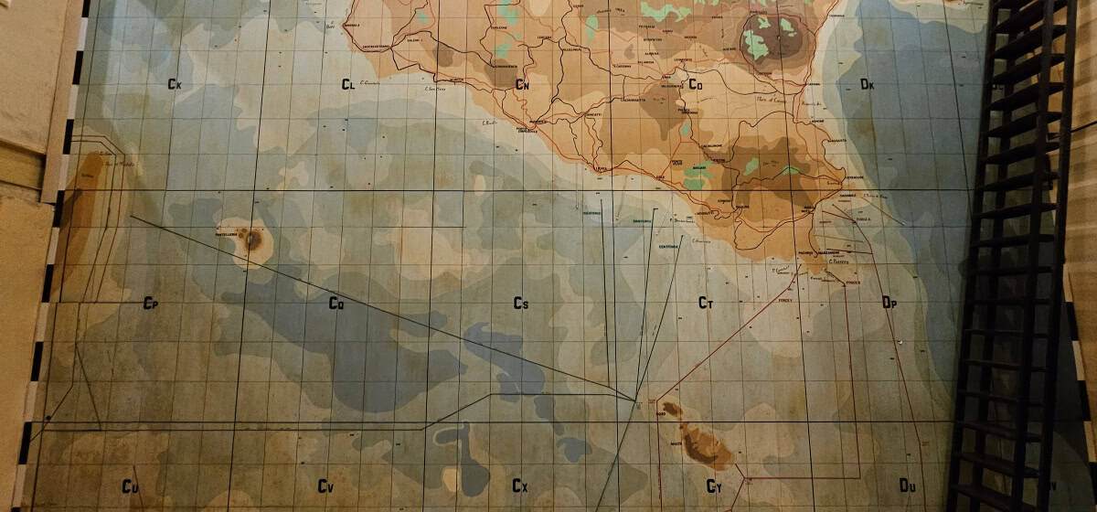 Ancient nautical chart of a maritime area with depth contours and navigation routes for maritime explorers.