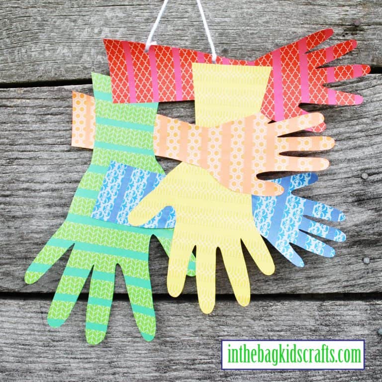 family handprints wall hanging easy kids' craft with construction paper and washi tape