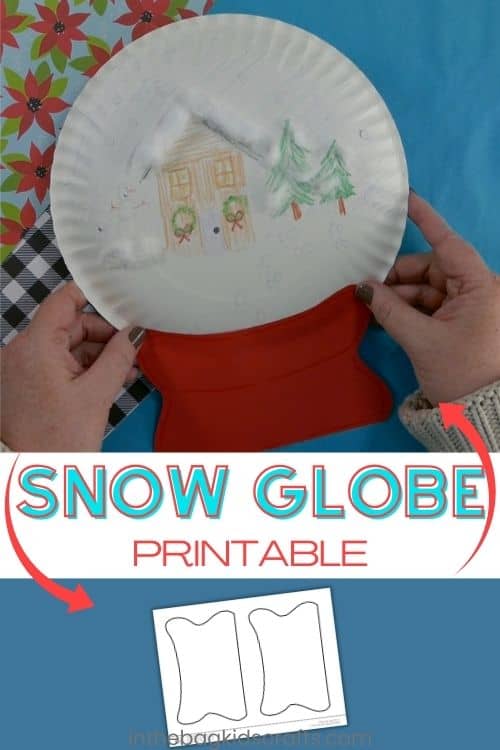 A handmade paper plate snow globe craft featuring a winter scene with trees and a house, designed as a fun preschool craft that doubles as a fine motor activity and creative winter craft for kids.