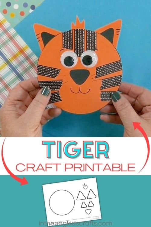 A child’s hands hold a round orange tiger made from paper and craft supplies as part of a preschool tiger craft and fine motor activity.