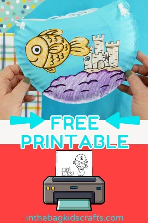 A colorful fish bowl craft for kids made from a paper plate craft, featuring a hand-colored goldfish craft swimming near a sandcastle with string handles for hanging.