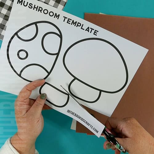 Paper mushroom craft step 1 using the free mushroom template