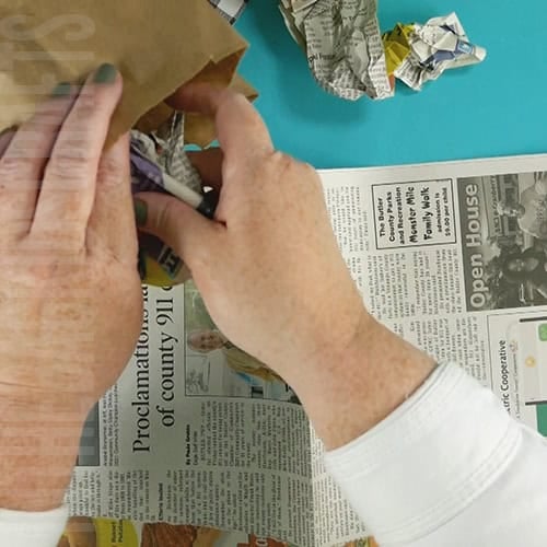 stuff the paper bag with crumpled newspaper step 5 of the deer craft 