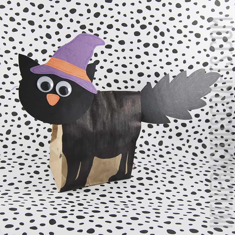 Black Cat Halloween Craft for Kids made from a paper lunch bag