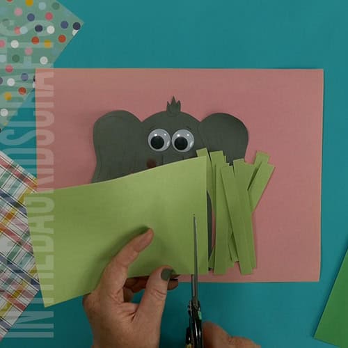 paper elephant craft step 6 cutting the paper grass 