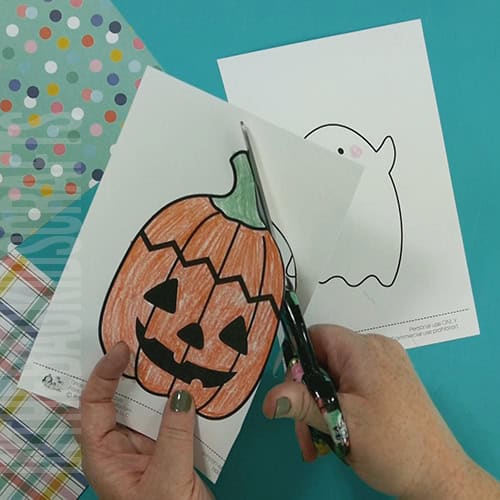 jack-o-lantern craft step 2 cuttint it out 