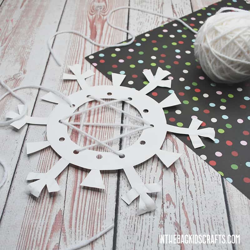 PAPER SNOWFLAKE CRAFTS WITH LACING STEP 3