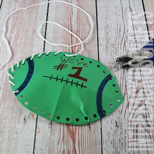lacing up a paper football craft